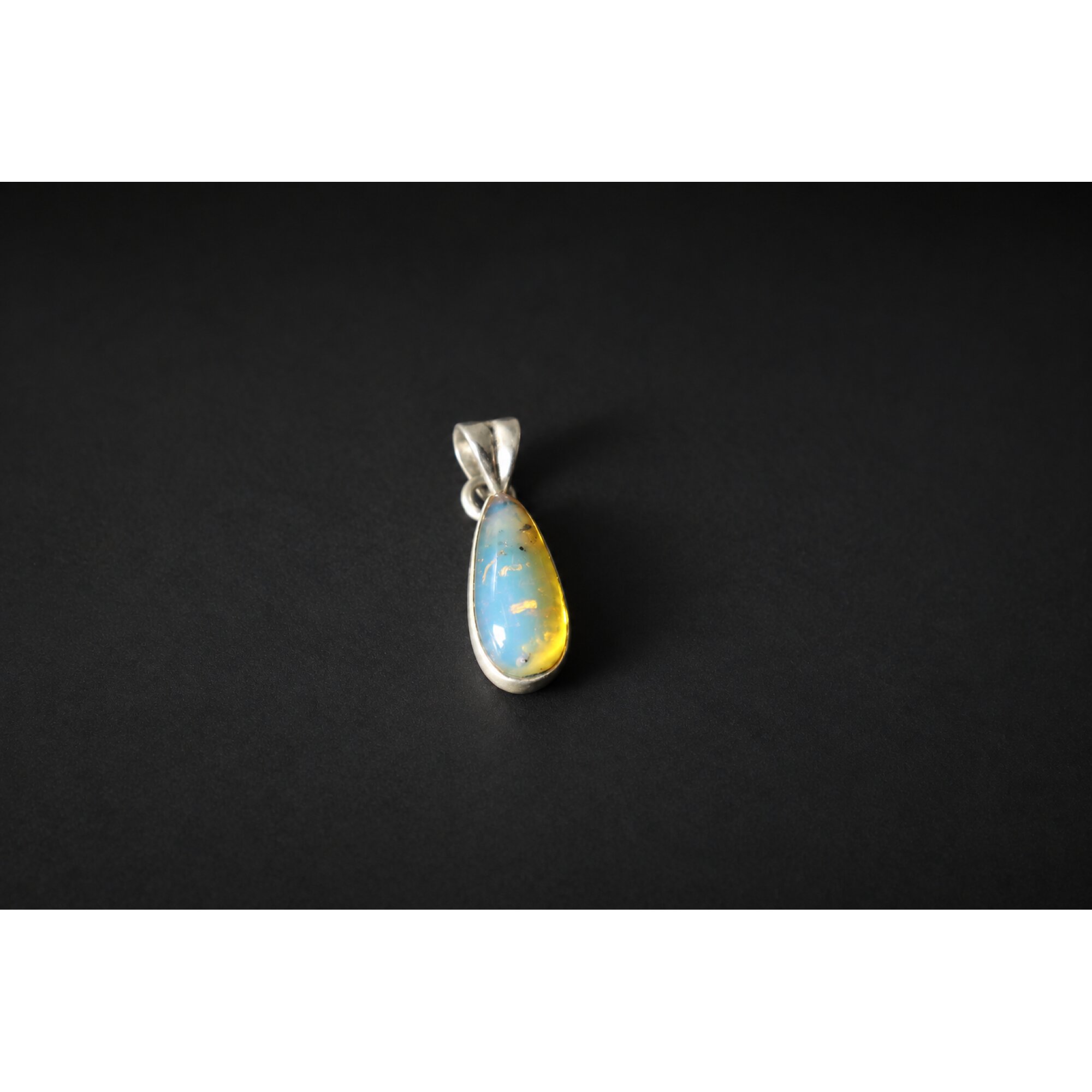 Handcrafted sky blue Dominican amber sterling silver pendant 27.5mm – photo 2