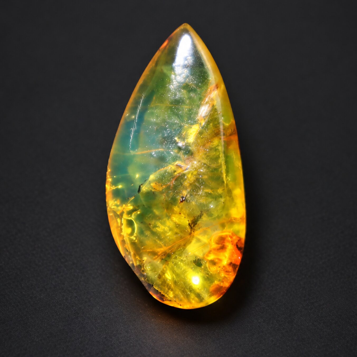 Authentic green blue polished Dominican amber 1.1g