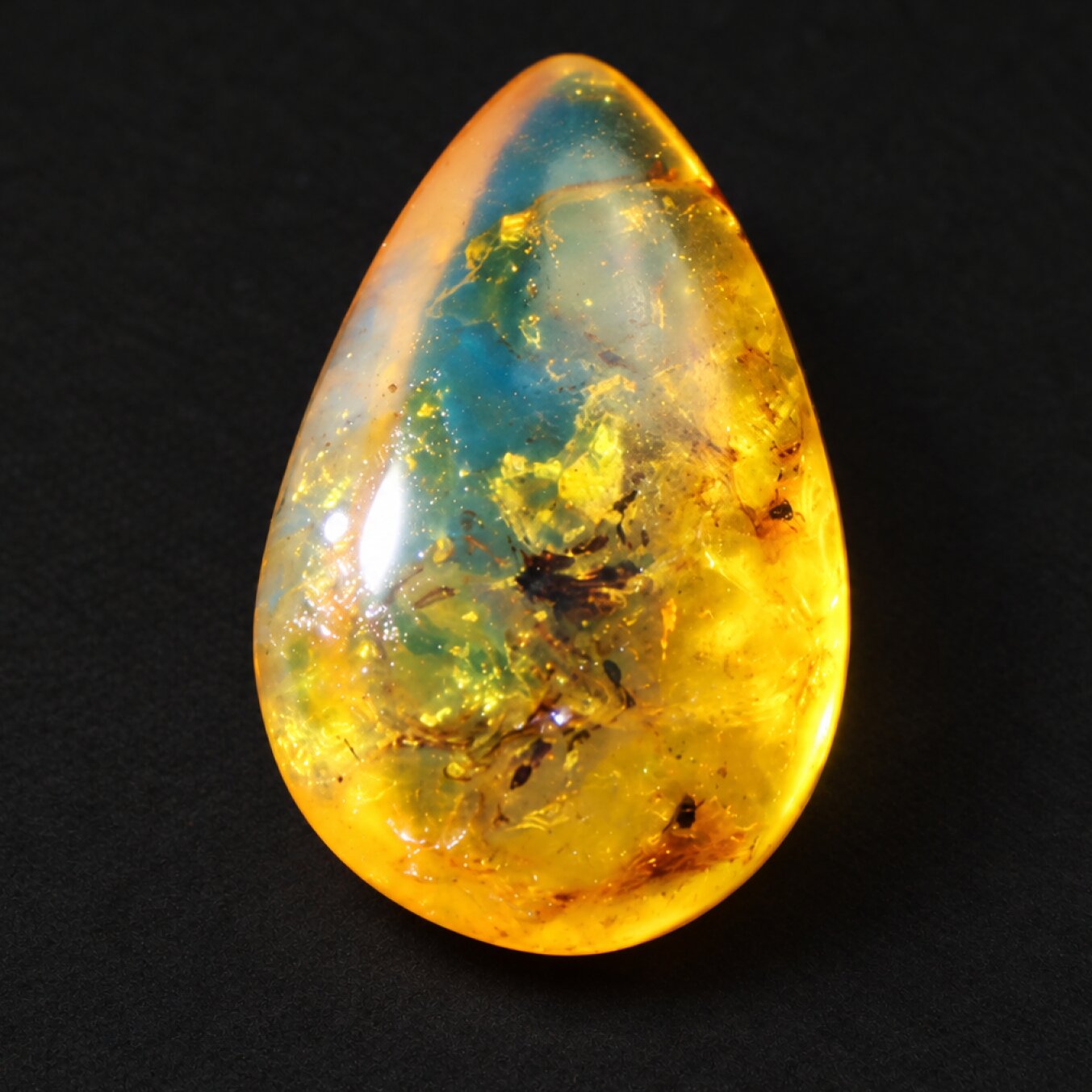 Pure natural orange blue polished Dominican amber 2.1g