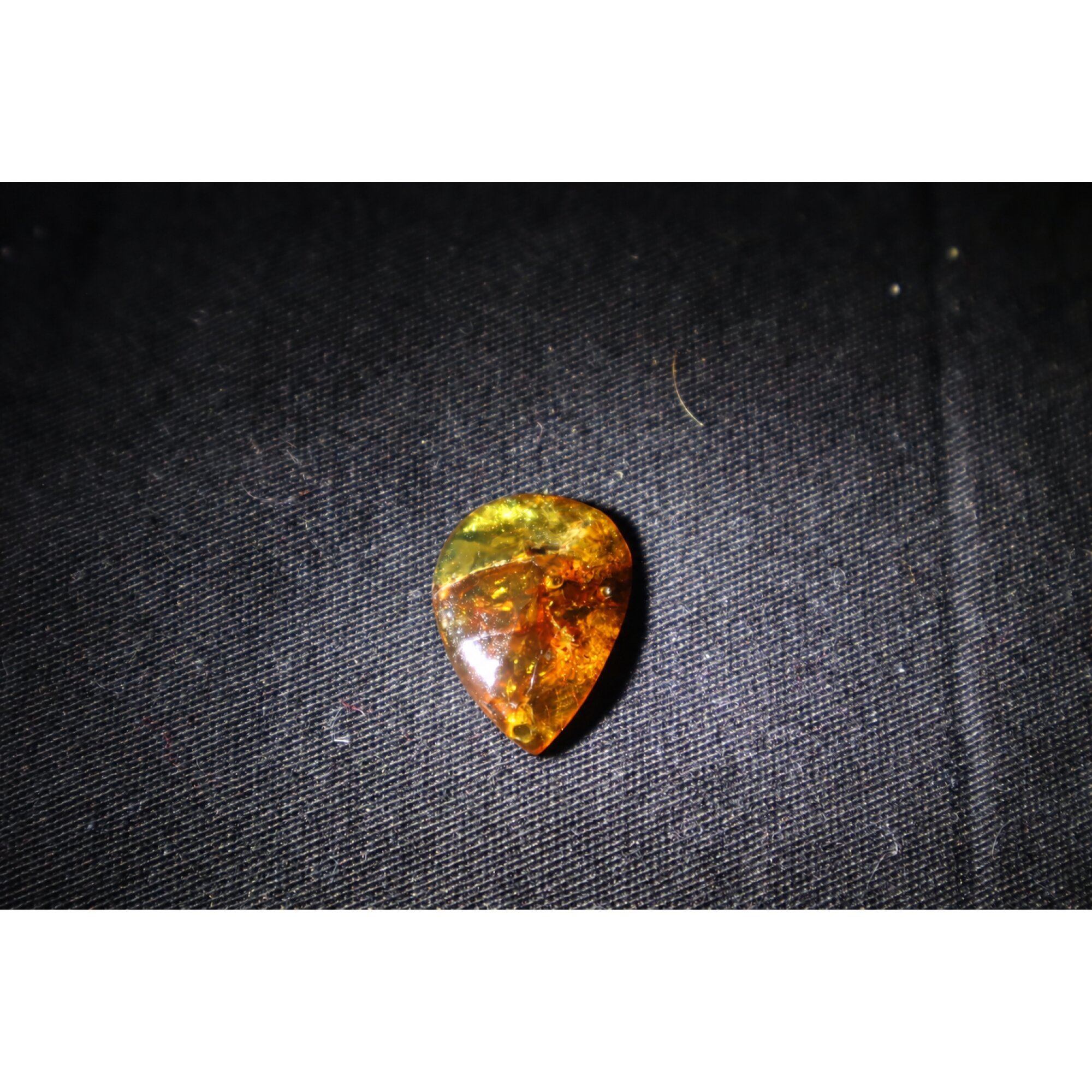 Natural yellow brown Dominican amber cabochon – photo 2