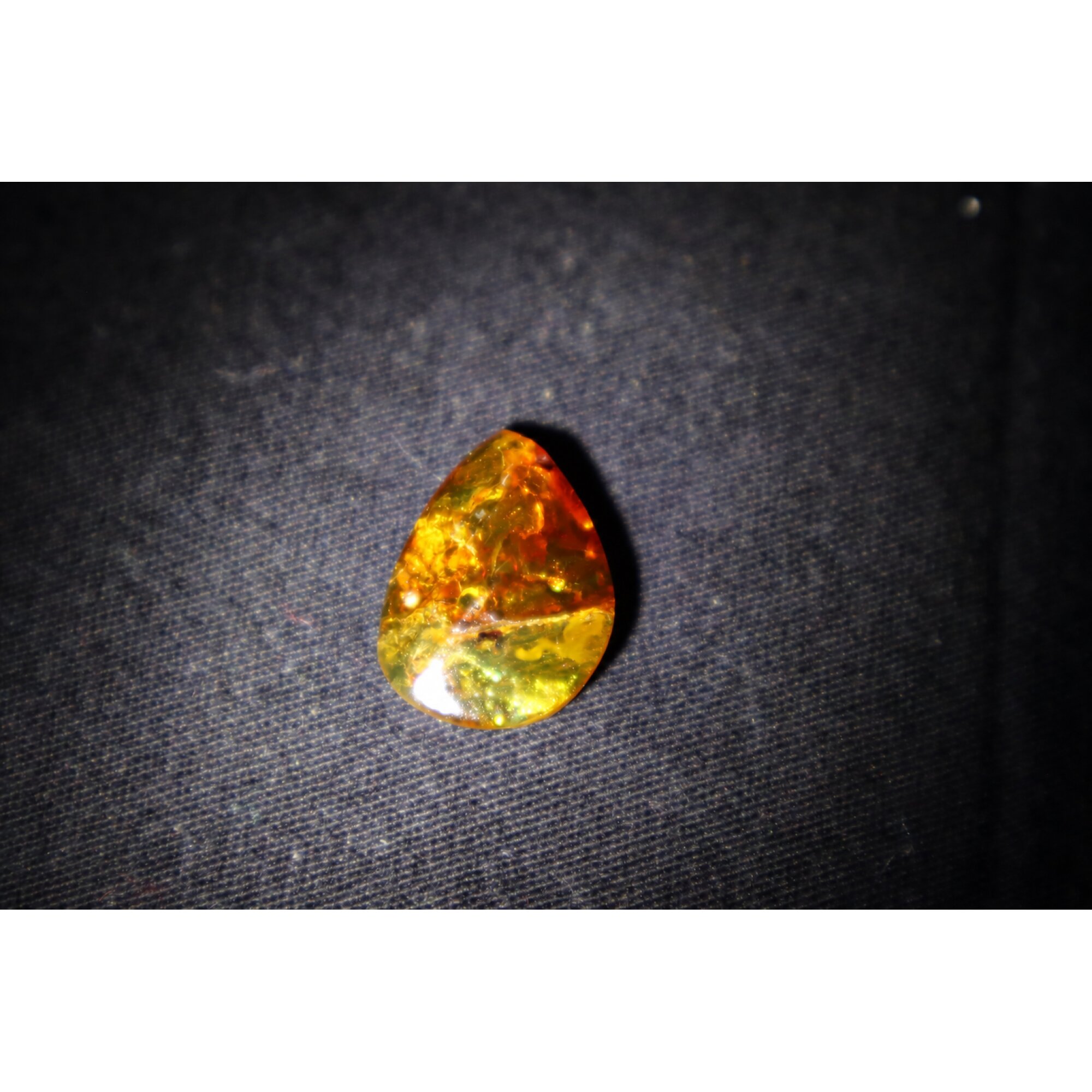 Natural yellow brown Dominican amber cabochon – photo 4