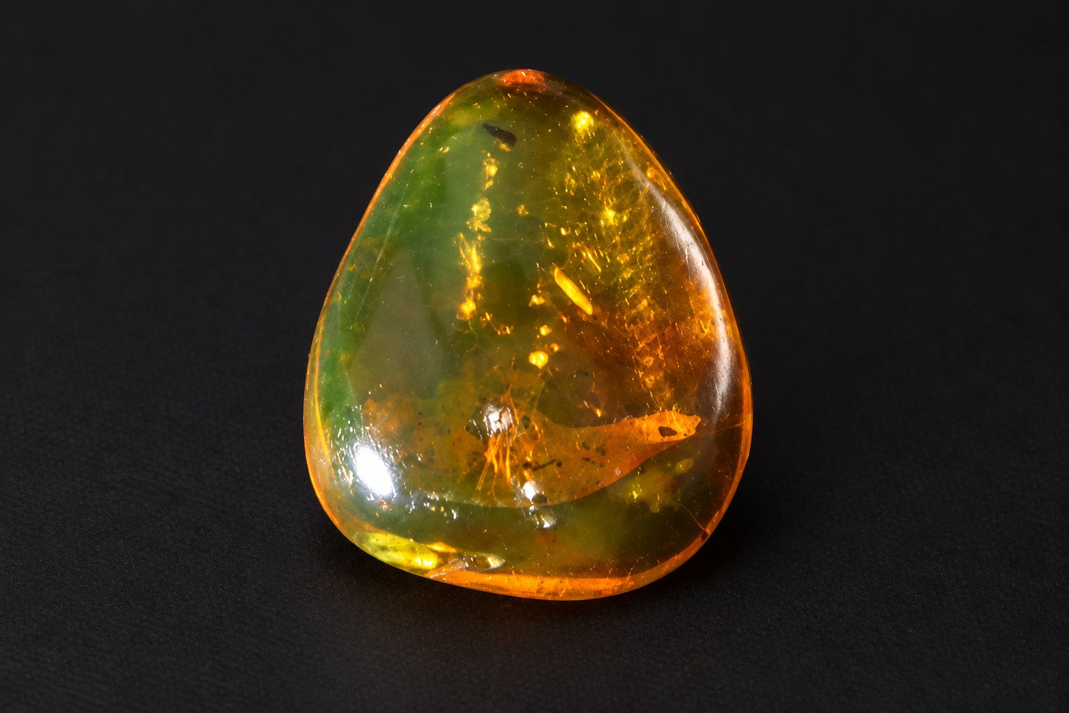 Authentic orange green Dominican amber cabochon – photo 7