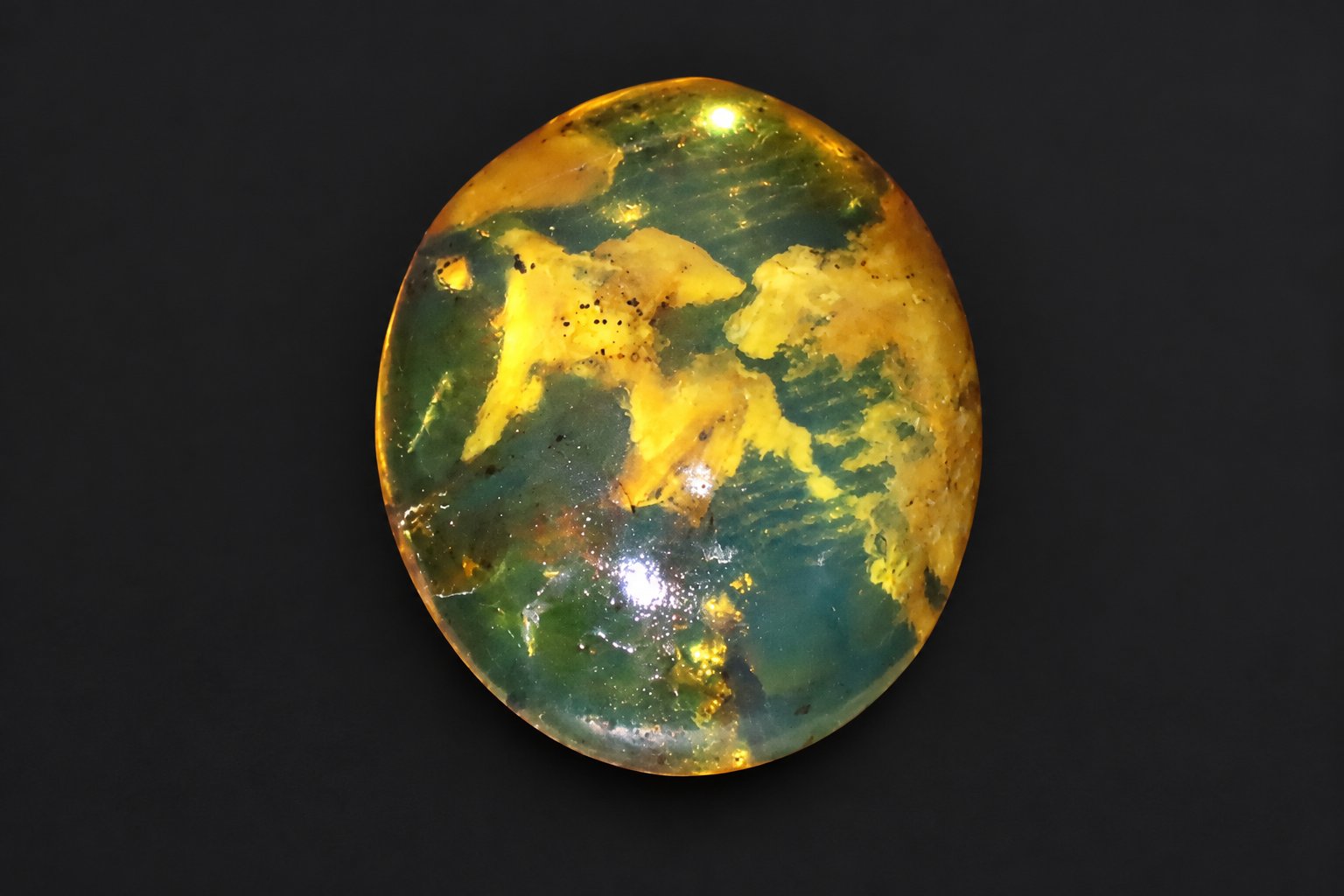 Authentic deep blue Dominican amber cabochon – photo 11