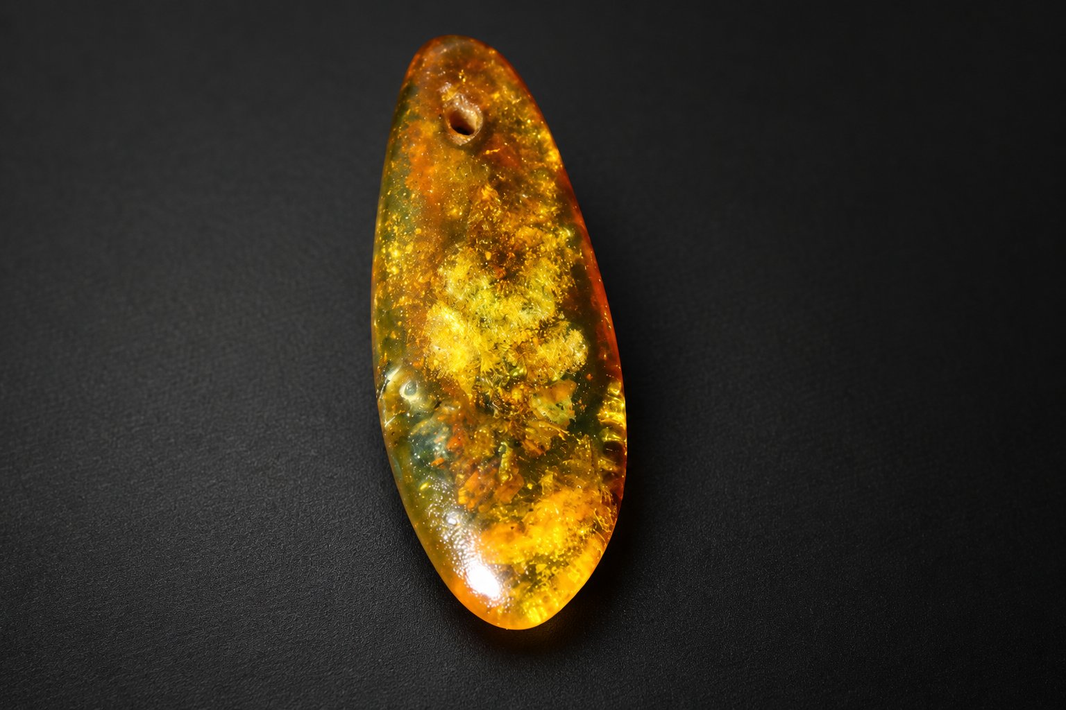 Real orange yellow polished Dominican amber – photo 2