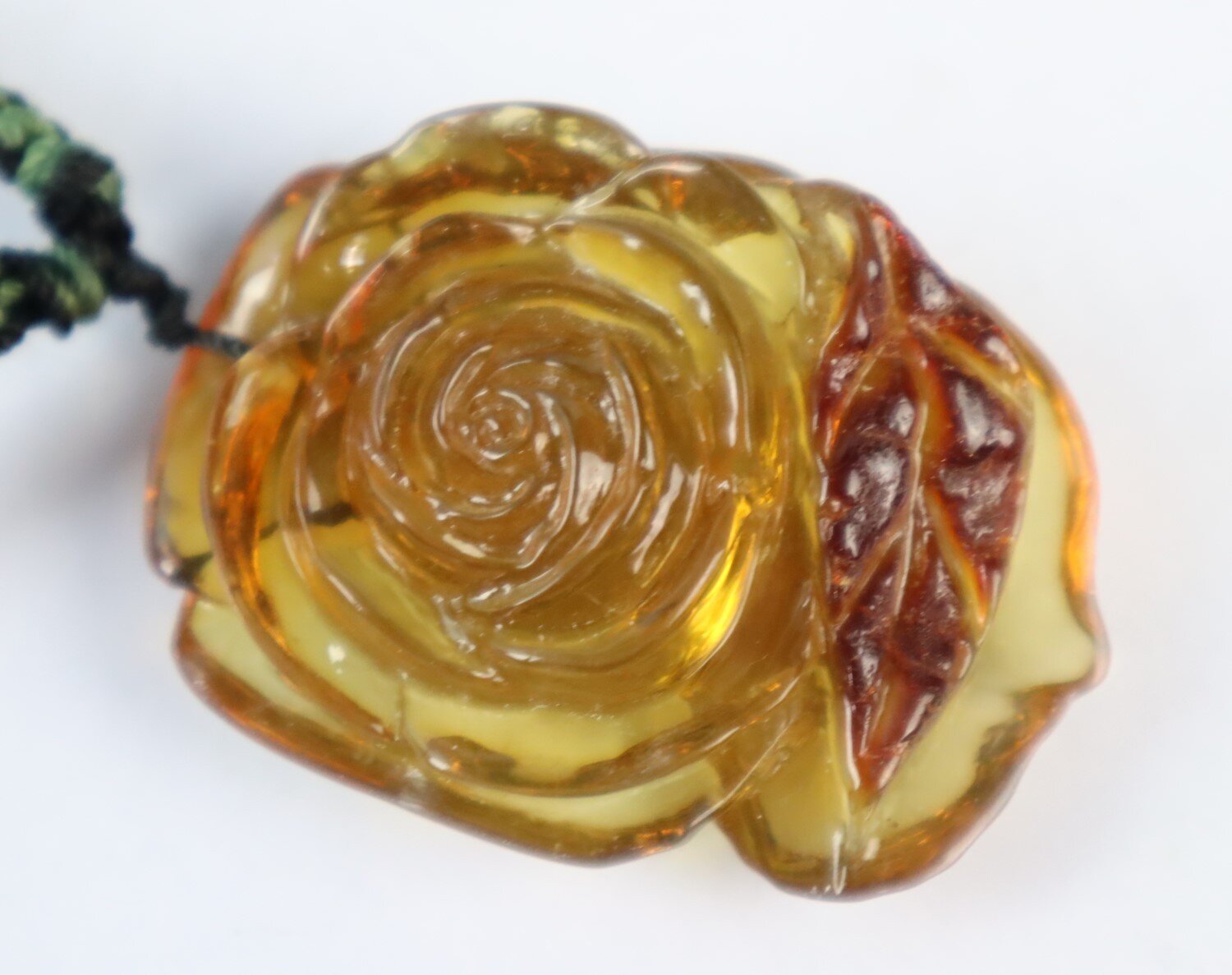 Hand-Carved Dominican Green Amber Pendant – Floral Design – photo 10