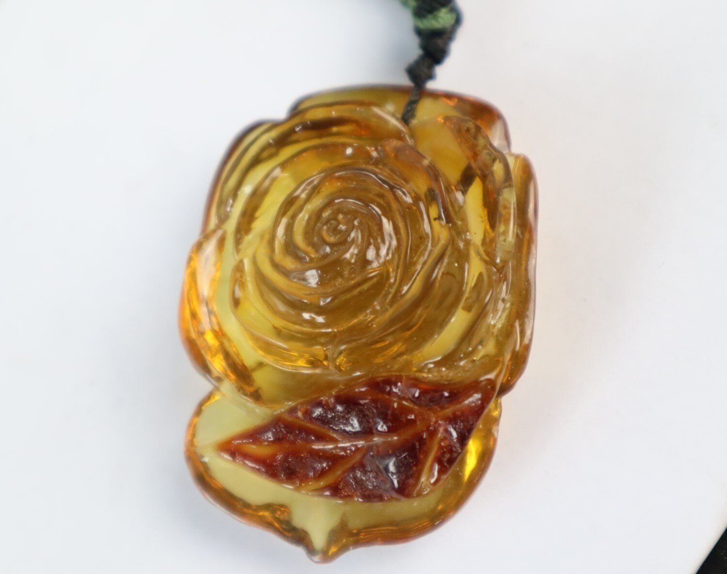 Hand-Carved Dominican Green Amber Pendant – Floral Design – photo 12